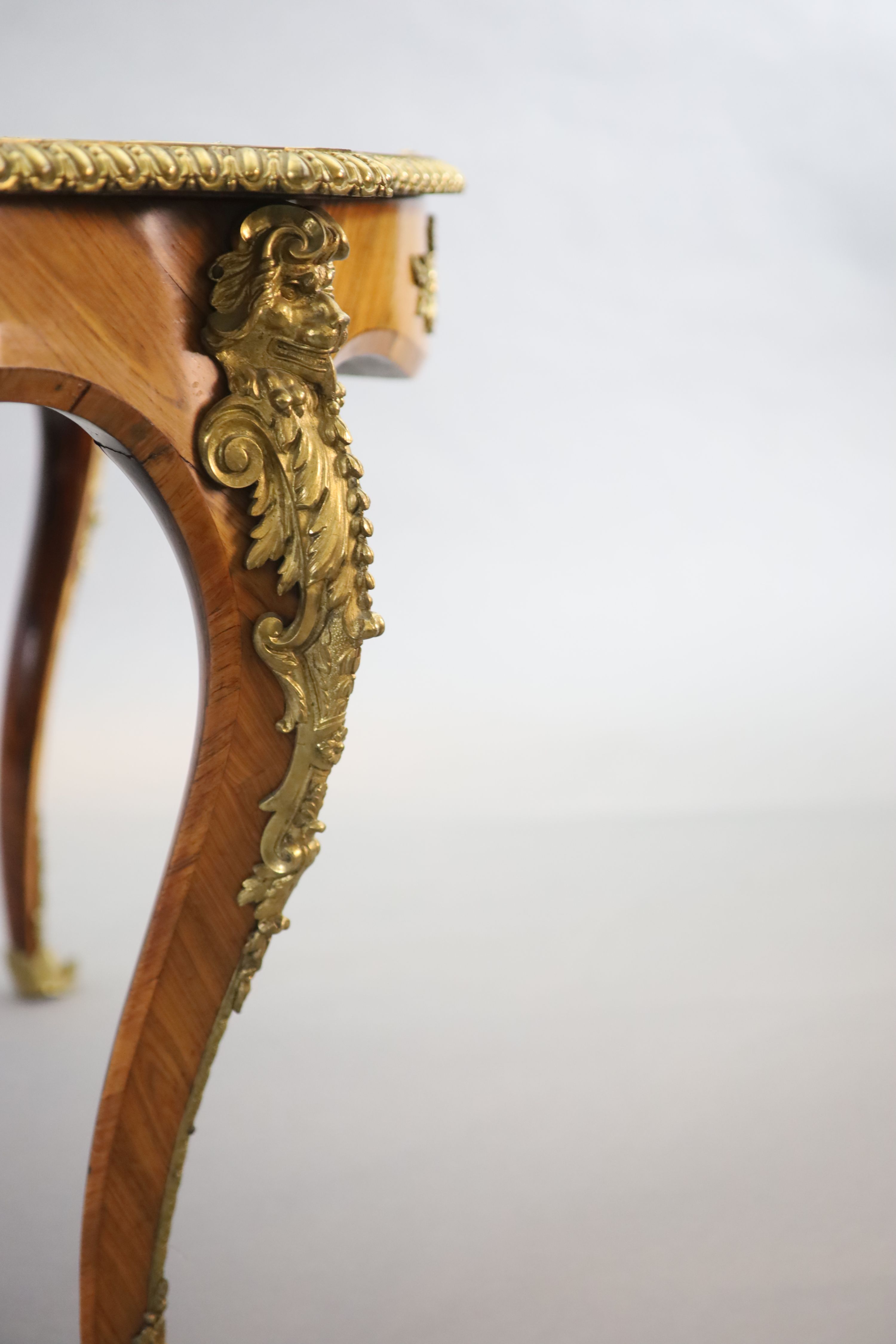 A Victorian Louis XV style ormolu mounted walnut centre table, W.122cm H.76cm